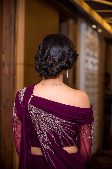 Twisted low bun for sangeet or engagement 