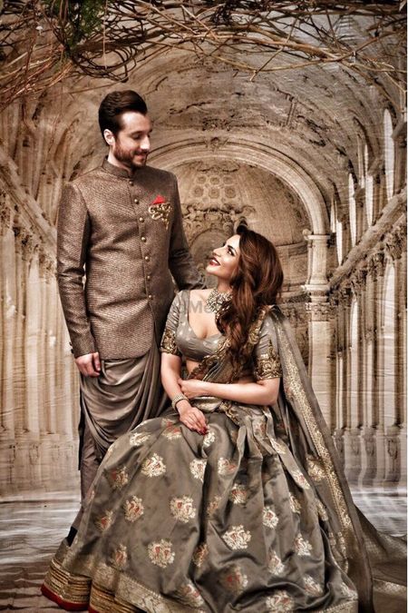 Dark grey outfits for bride and groom engagement and sangeet 