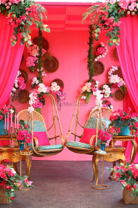 Bright floral mehendi swing decor idea
