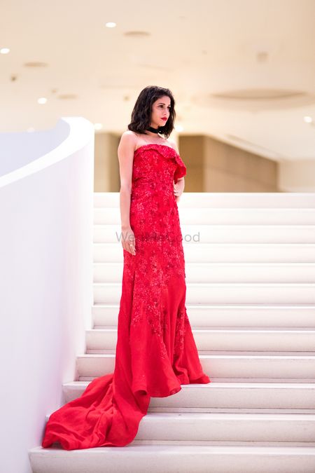 Photo of red cocktail gown with trail