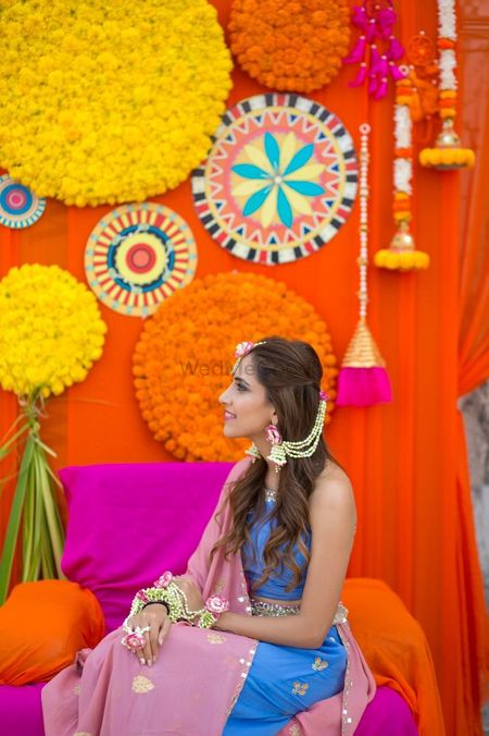 Photo of Floral decor with unique props for mehendi ceremony