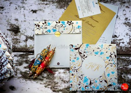 Photo of turquoise and gold invitation