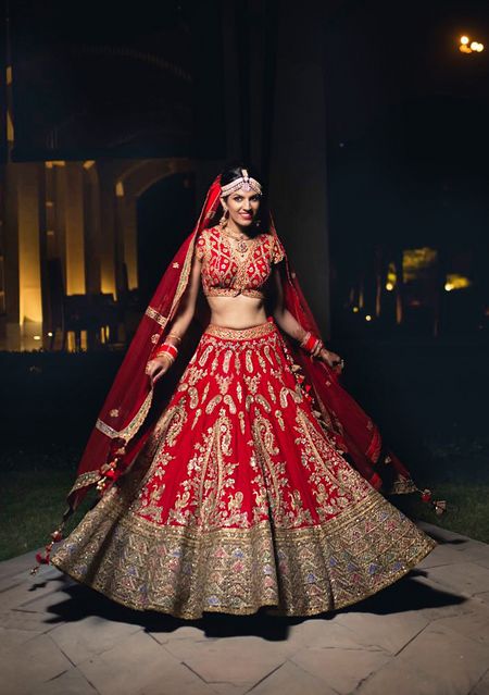Photo of Red and grey bridal lehenga with unique blouse