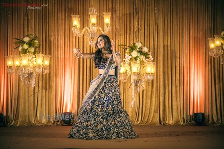 Bride dancing on sangeet shot