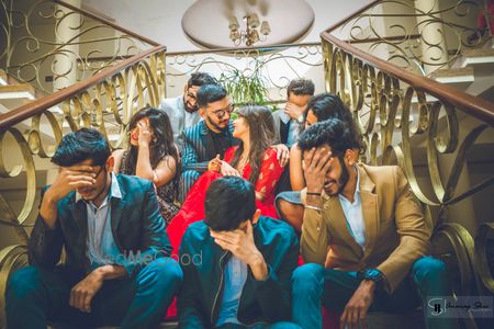 Photo of Couple portrait with friends