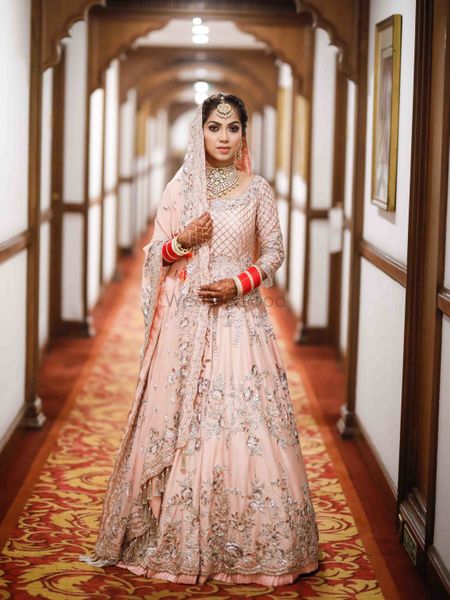 Light pink Anarkali with silver work for Sikh bride
