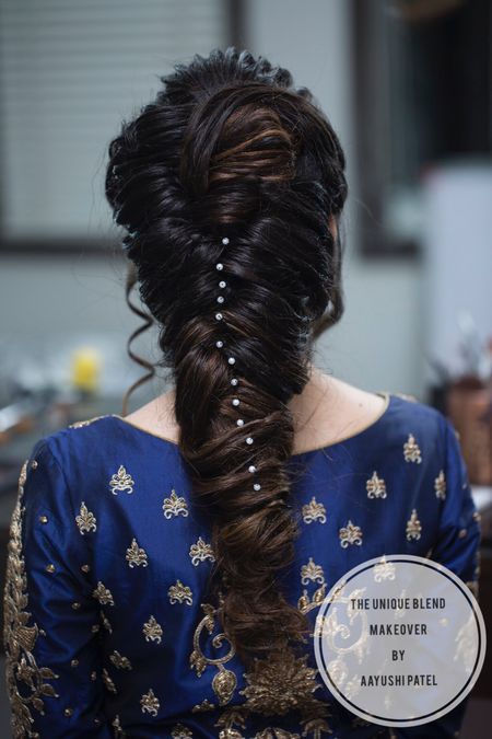 Unique braid with pearls in hair