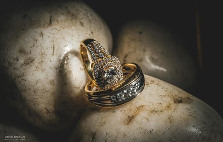 His and her solitaire engagement ring photography idea