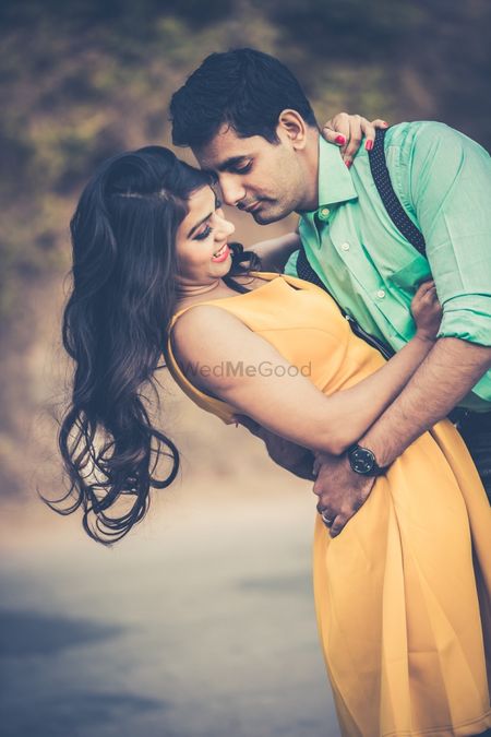 Photo of yellow and blue pre wedding shoot