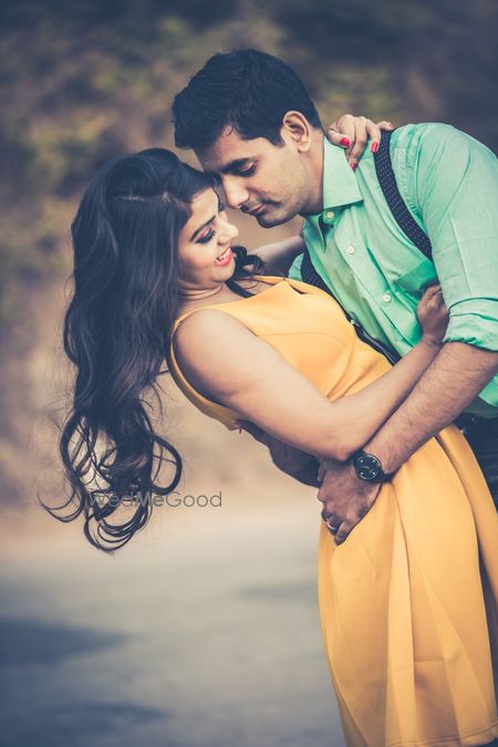 Photo of yellow and blue pre wedding shoot