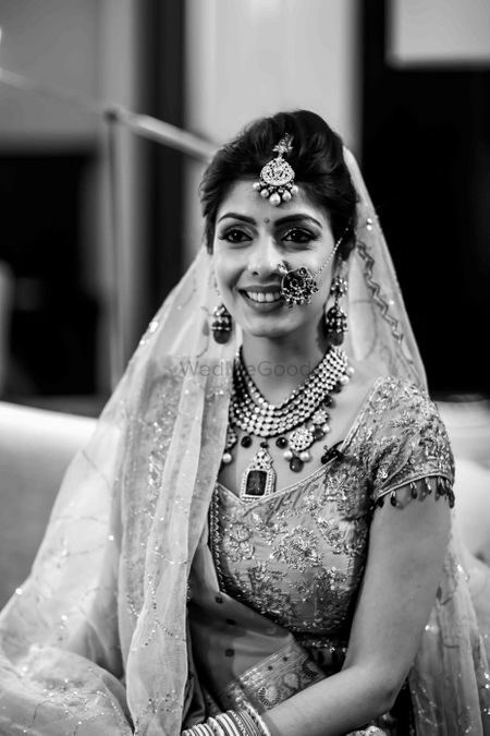Photo of Black and white bridal portrait with unique jewellery