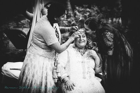 Black and white photography of bride and her mom