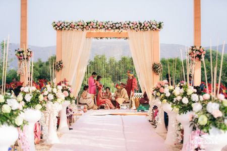 Beautiful mandap set up with floral against mountain scenery