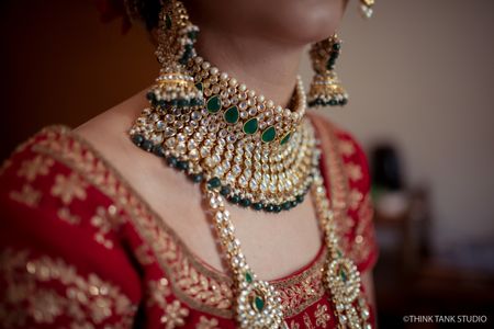 Bridal jewellery with green beads and layered necklace 