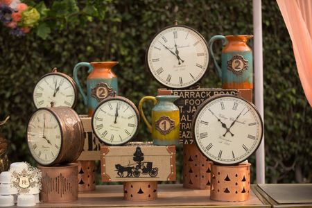 Unique vintage clocks and trunks themed decor for a day function