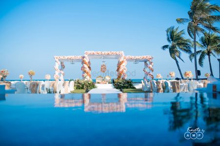 Stunning open air floral mehendi set up in white and orange