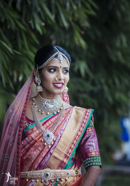 Photo of South Indian bridal jewellery with diamonds and emeralds
