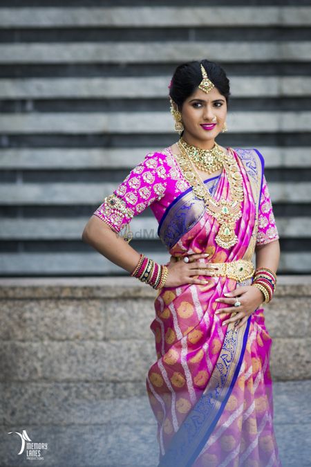 Bridal saree with pink and purple temple jewellery