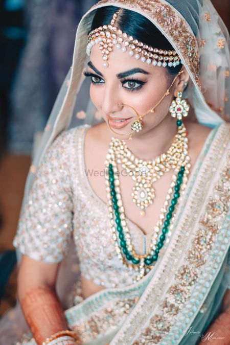 Bride wearing offbeat lehenga and contrasting jewellery 
