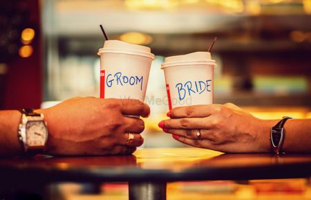Bride and groom cups pre wedding shoot