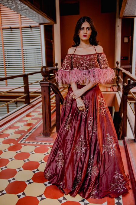 Maroon gown for sangeet with fur 