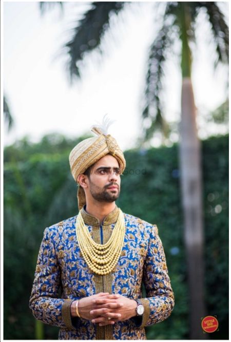 Tall fit handsome Indian guy with beard sherwani different pose in  photoshoot with smile and proper jaw line and good eyes further add  different pose of same guy with family members