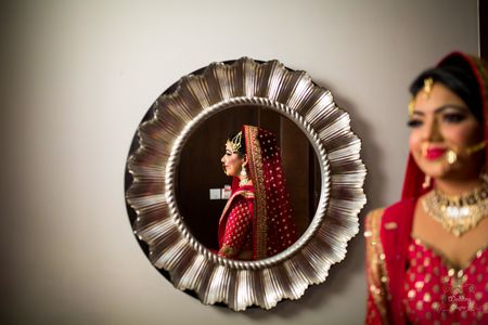 Bridal portrait in mirror 
