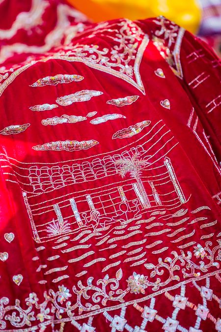 Personalised bridal lehenga with love story embroidery 
