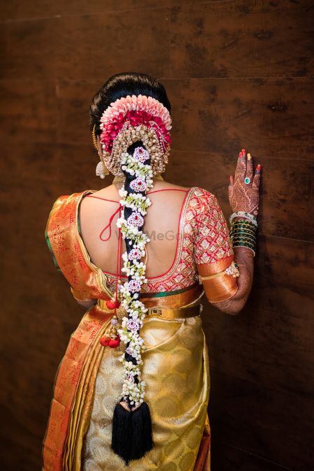 South Indian bridal hairstyle with flowers