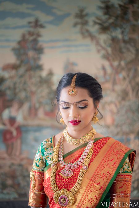 South indian bridal look with layered temple necklaces 