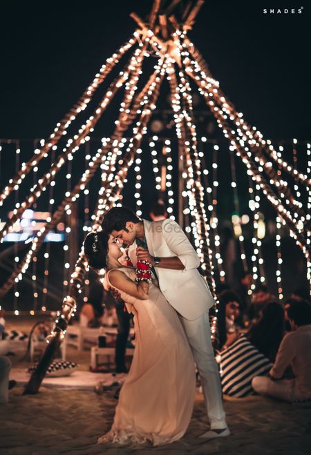Romantic couple shot with fairy light decor 