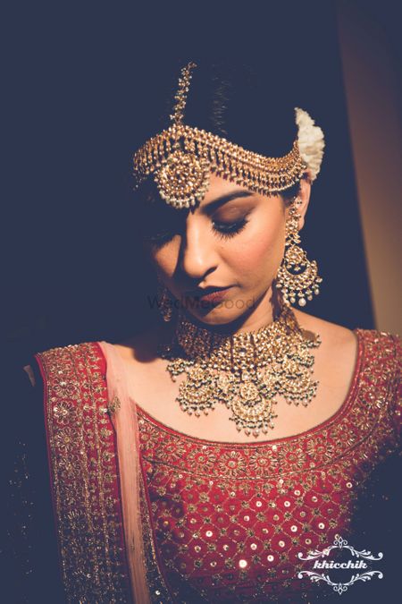 Bridal jewellery with necklace and matching earrings and mathapatti