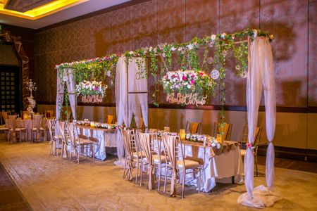 Pretty wedding decor with hanging floral decoration 