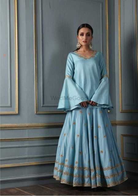 Simple light blue lehenga with bell sleeves for roka or sister 