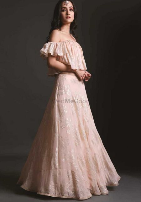 Engagement outfit soft pink lehenga with off shoulder blouse 