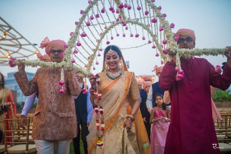 Bridal entry idea with round phoolon ka chadar 