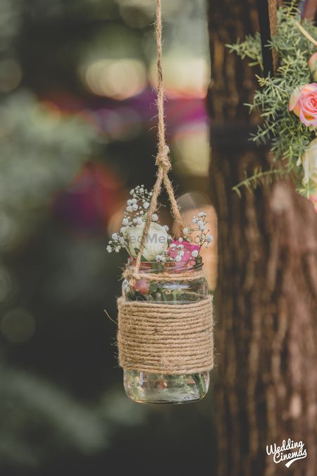 Flowers and babys breath in mason jars DIY