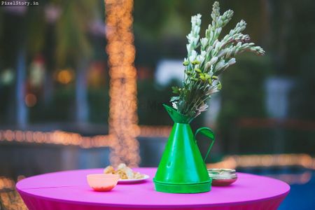 watering can table centerpiece
