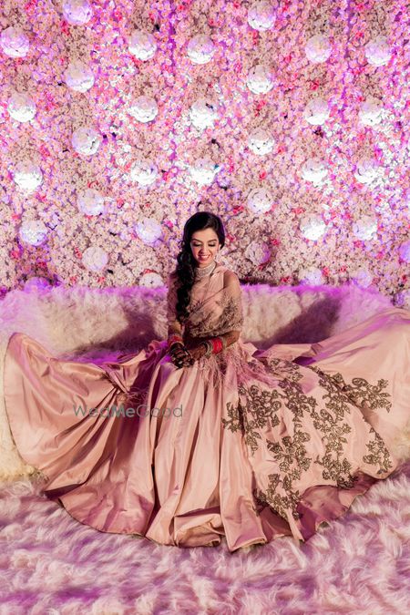 Light pink flared cocktail gown for sangeet