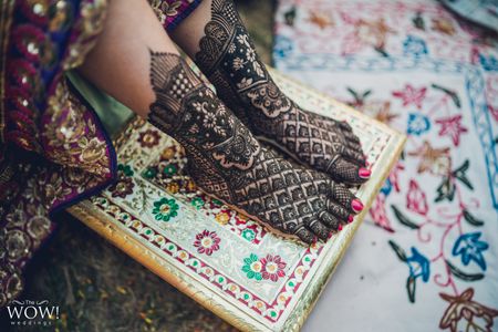 Bridal feet mehendi design with intricate details 