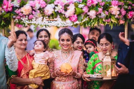 South Indian bride entering under phoolon ka chadar 