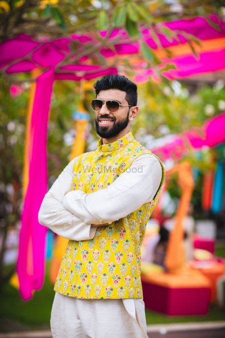 Quirky yellow mehendi jacket for groom 