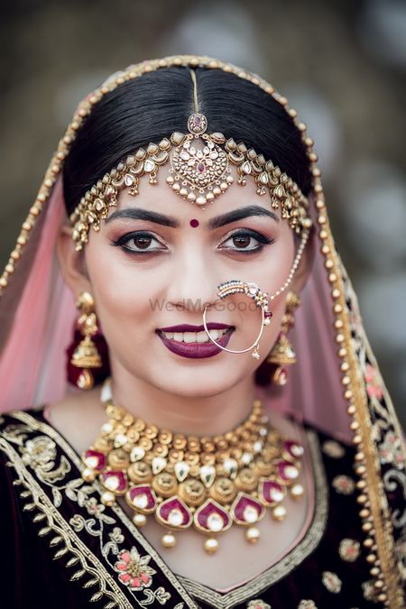 Photo of Bride with dark vampy lips