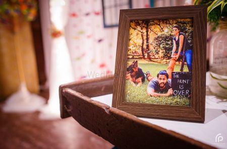 Photo of Wedding Photo Display Idea in Frame on Table