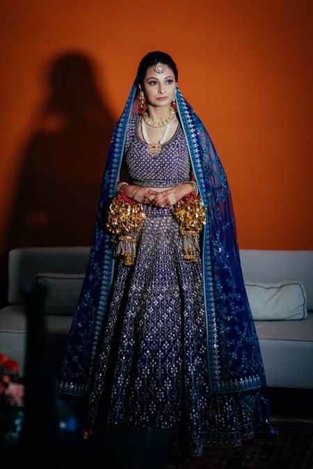 Photo of Offbeat bridal lehenga in navy blue