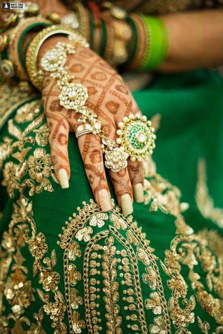 Photo of Pretty bridal hands with haathphool