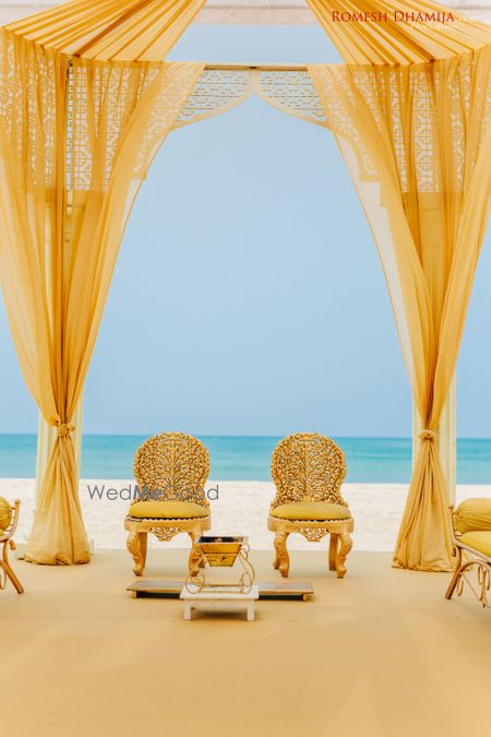 Yellow simple beachside mandap 