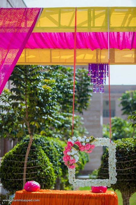 Photo of Pretty floral photo booth for mehendi