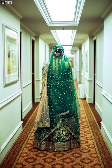 A bride in dark green 