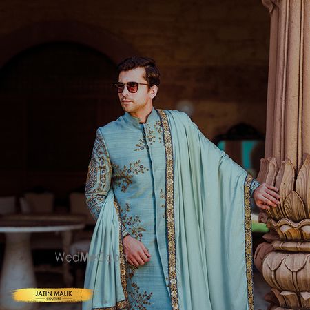 Unique sherwani in light blue colour 